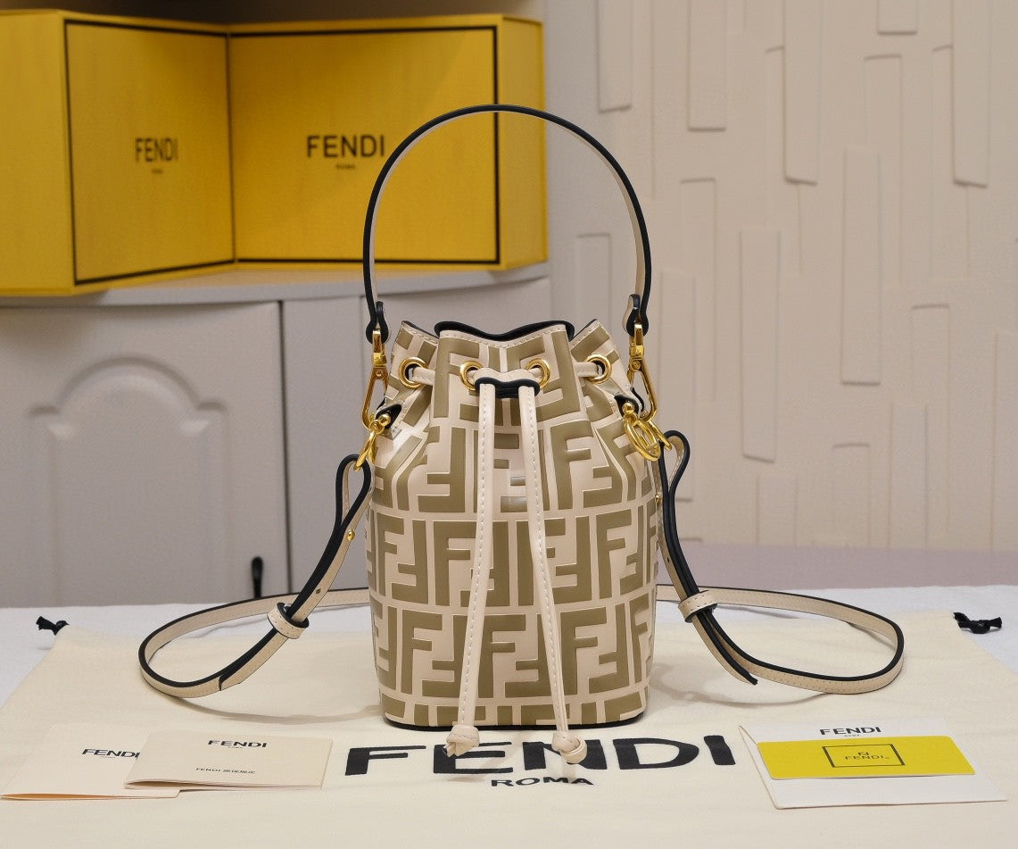 Fendi Mini Mon Trésor bucket bag in a beige and white FF jacquard fabric and leather