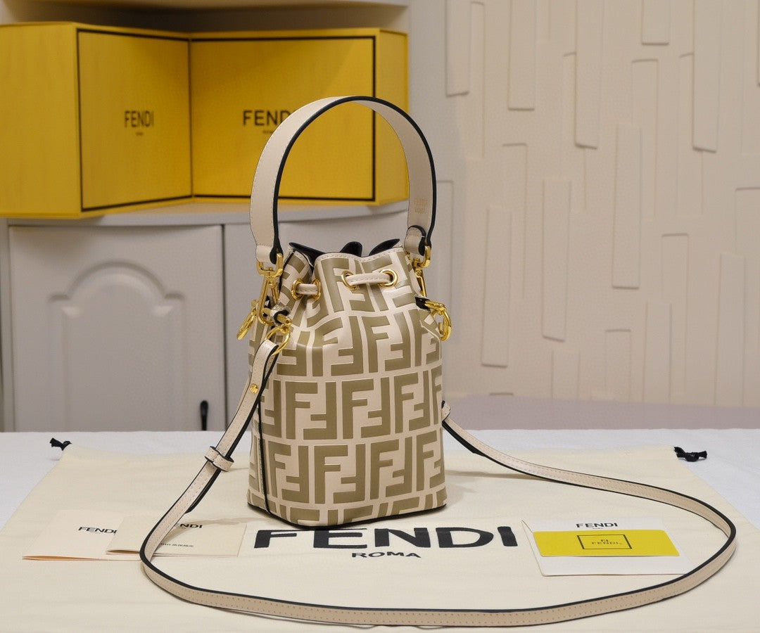 Fendi Mini Mon Trésor bucket bag in a beige and white FF jacquard fabric and leather