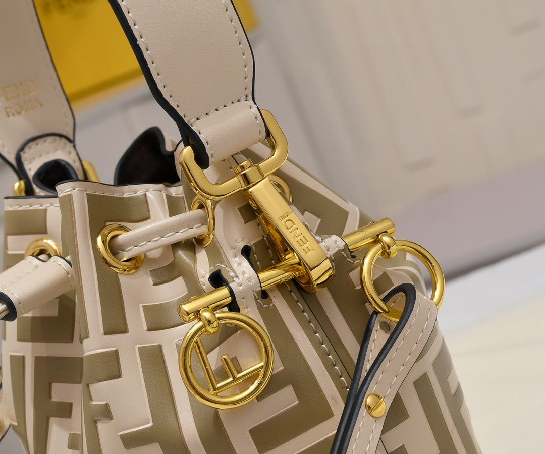 Fendi Mini Mon Trésor bucket bag in a beige and white FF jacquard fabric and leather