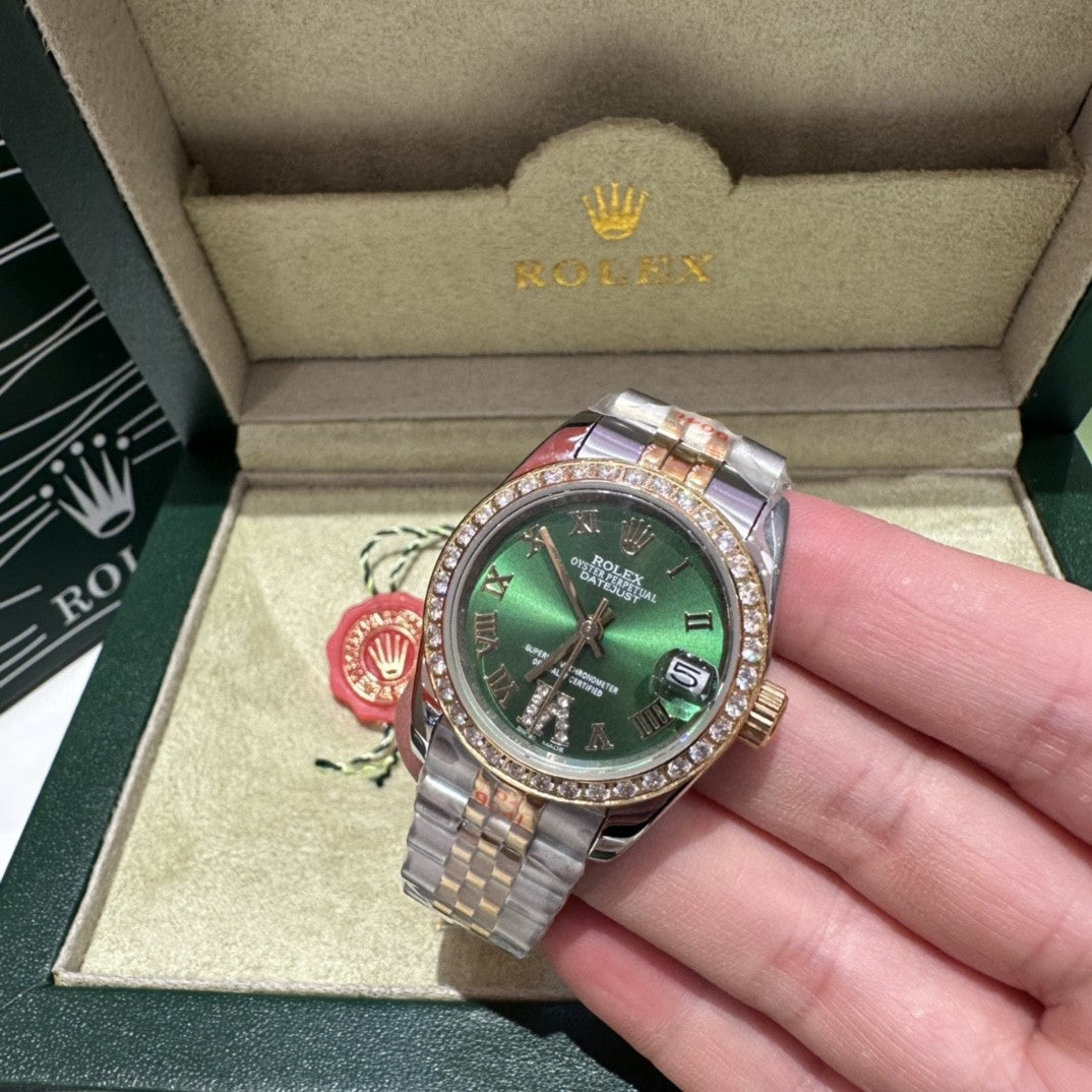 Rolex Datejust watch with a green dial, two-tone