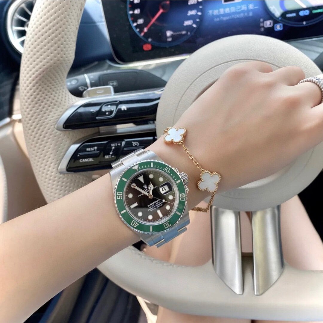 Rolex Submariner Date 40mm in Oystersteel with a green Cerachrom bezel and black dial