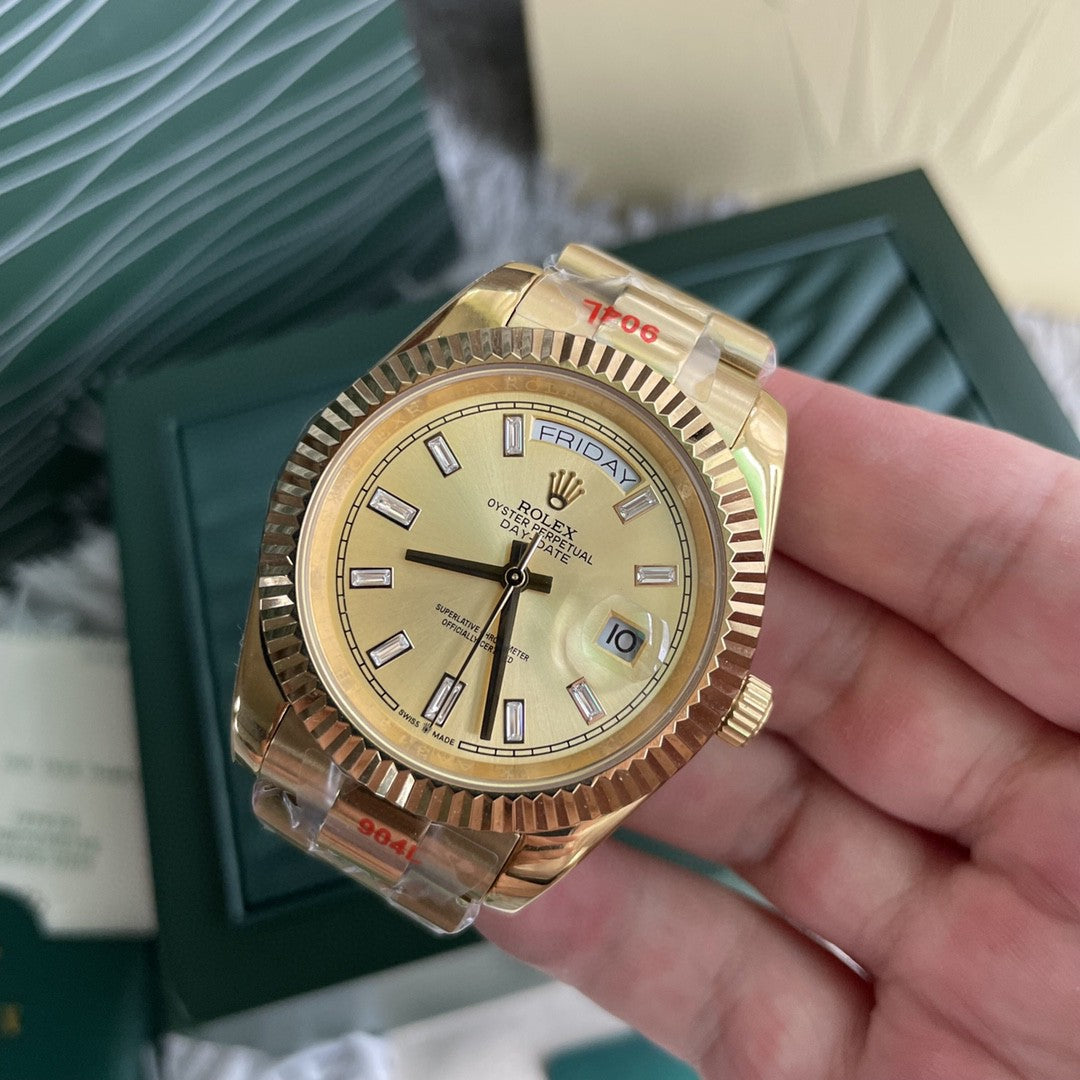 Rolex Day-Date 40 reference 228238 in 18k yellow gold with a champagne dial