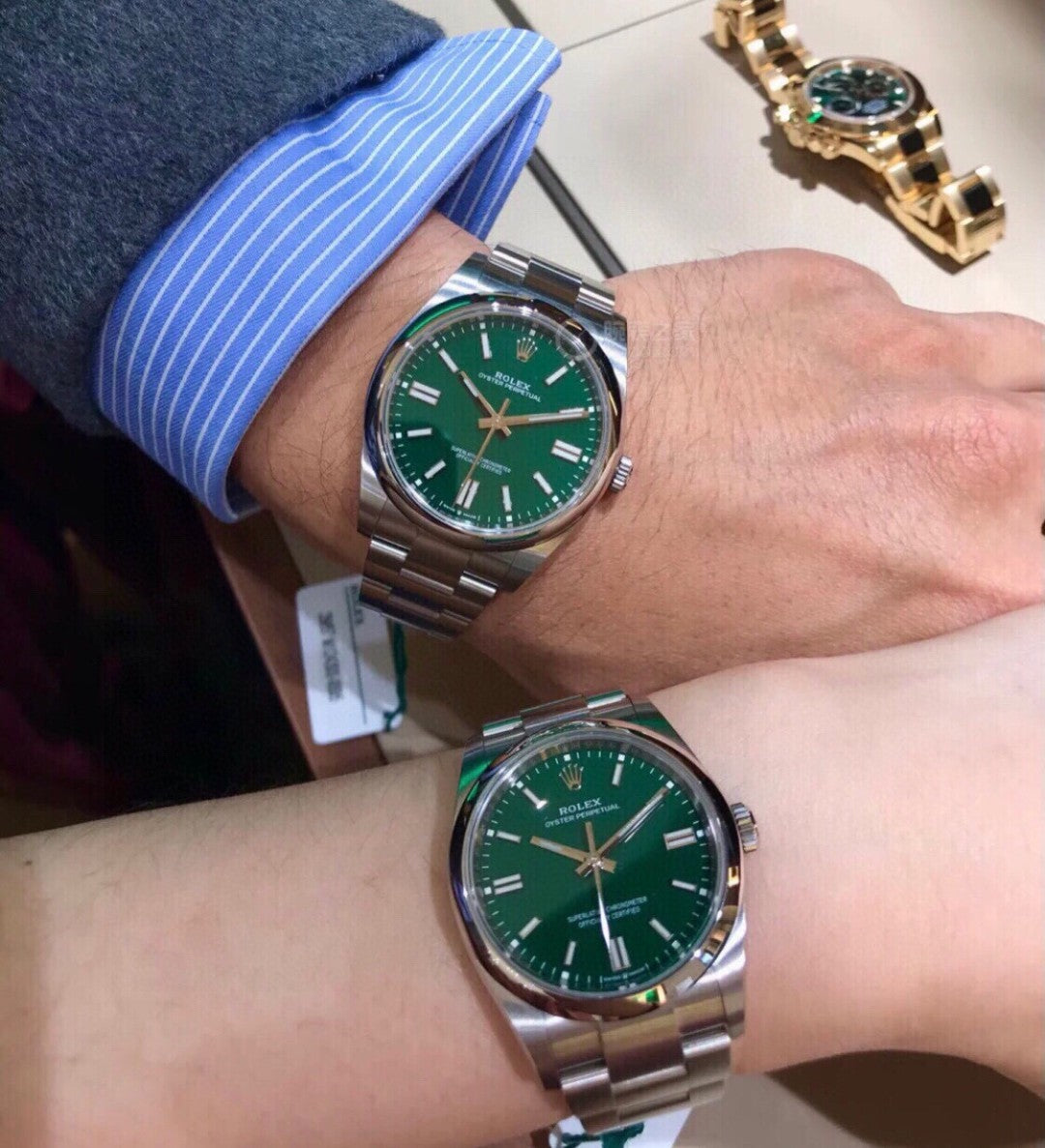 Rolex Oyster Perpetual watch in Oystersteel with a green dial