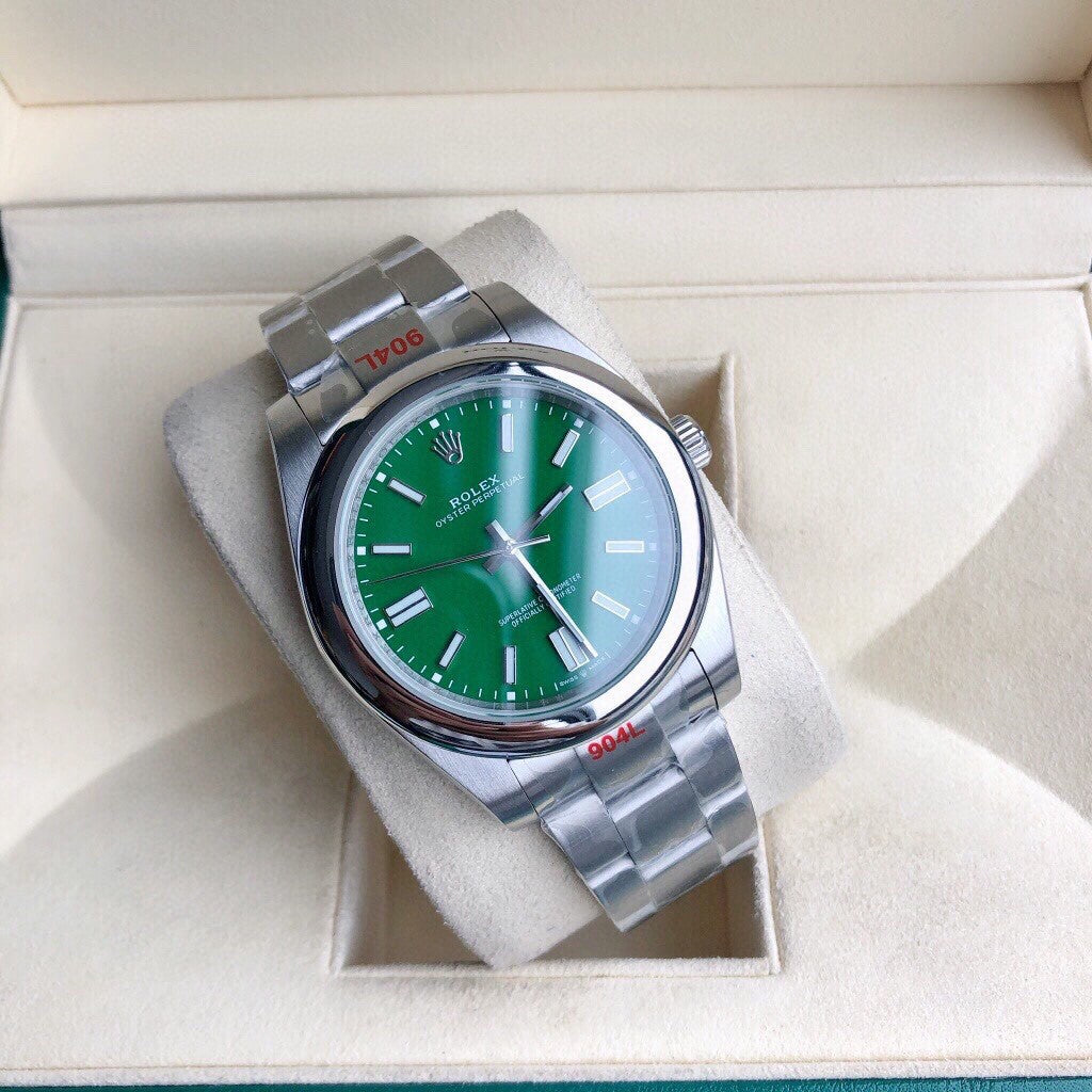 Rolex Oyster Perpetual watch in Oystersteel with a green dial