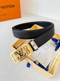Louis Vuitton reversible leather belt with a gold LV logo buckle