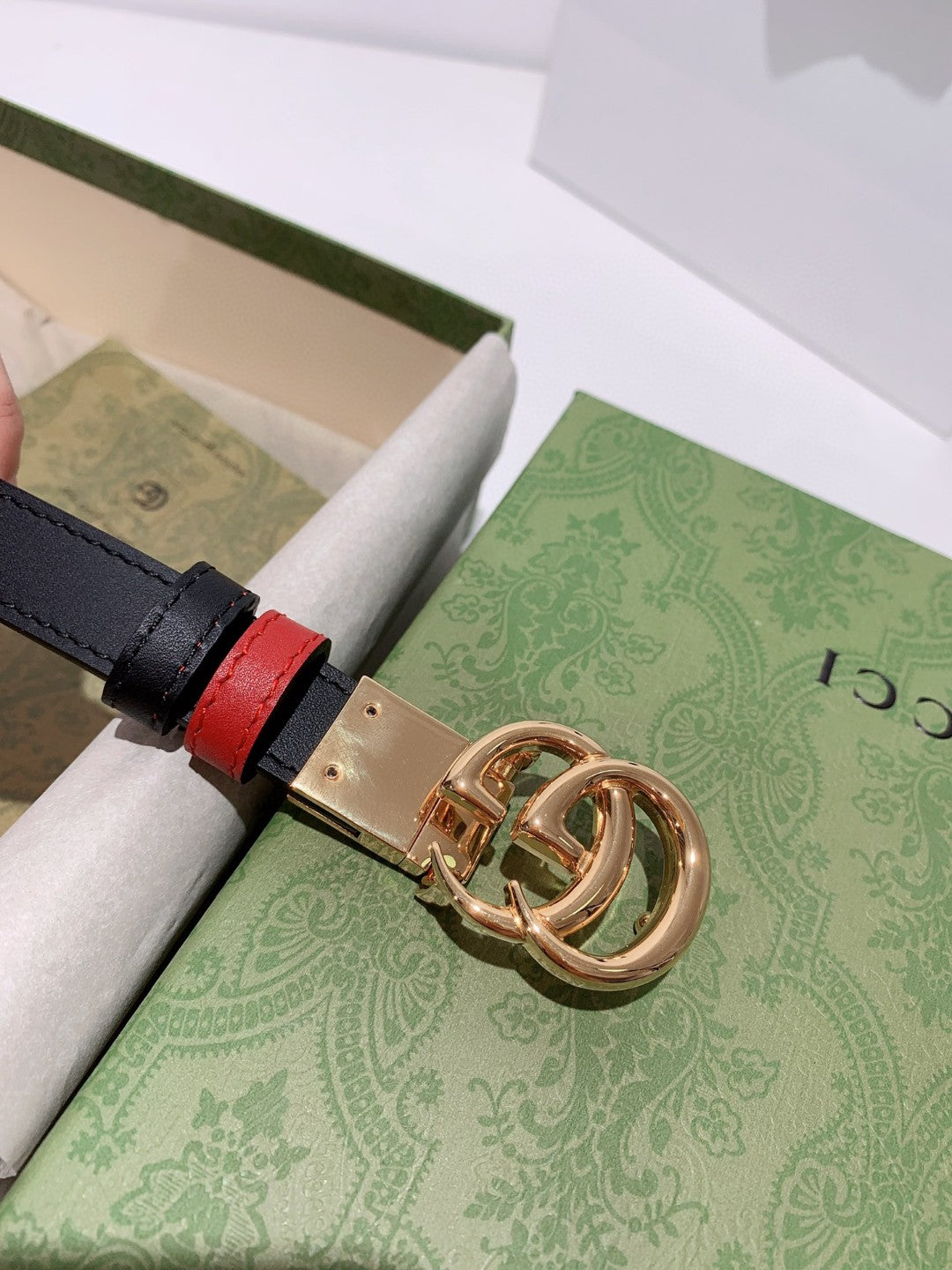 Gucci reversible leather belt in black and red with a gold-toned GG Marmont buckle