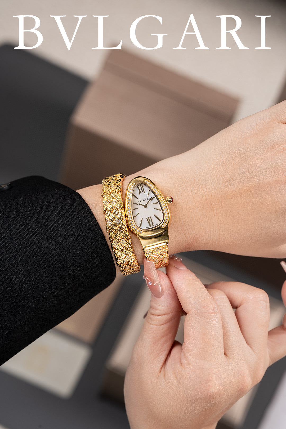 Bulgari Serpenti Spiga single-spiral watch in 18 kt yellow gold and diamond-set bezel