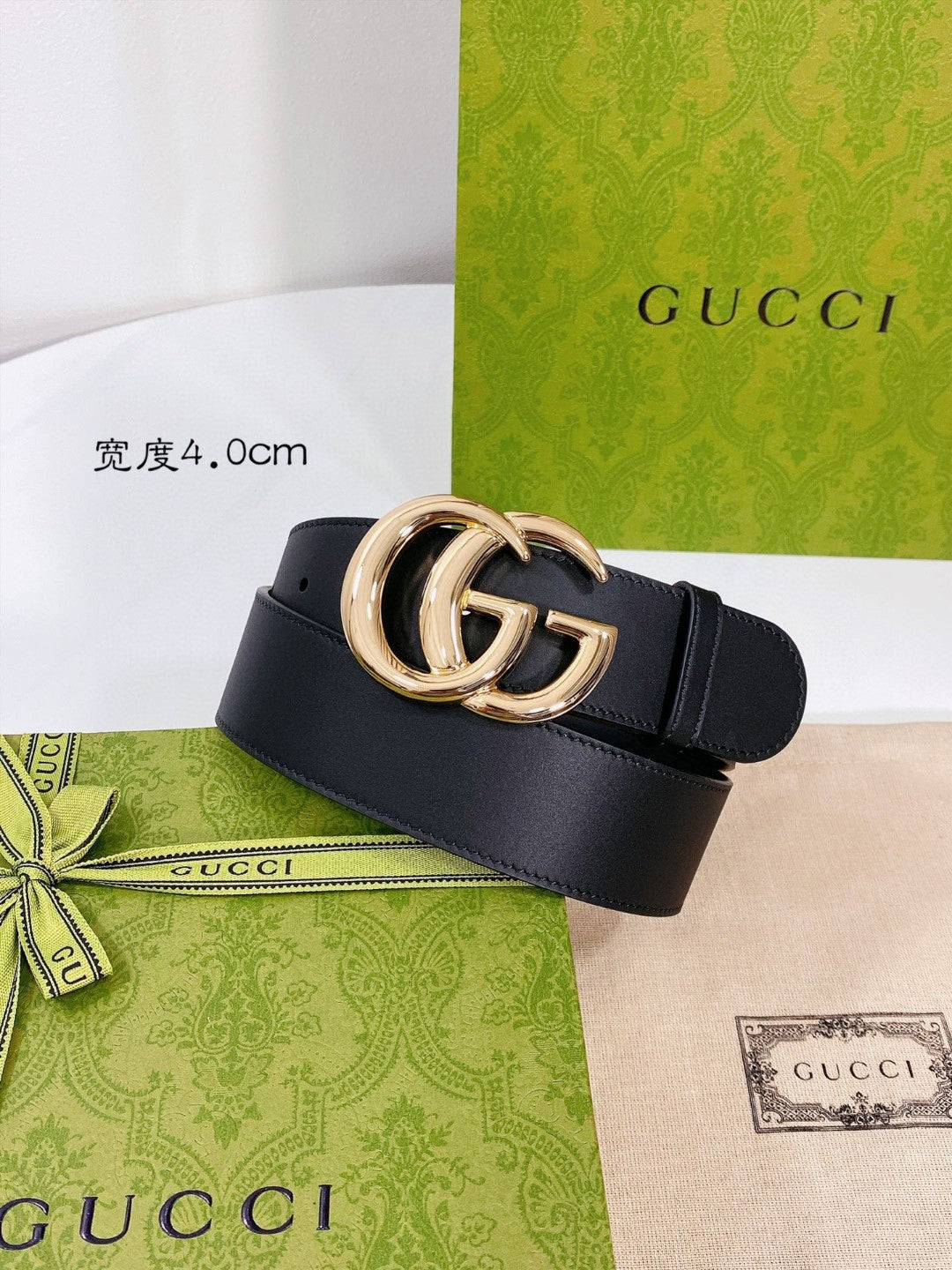 Gucci GG Marmont black leather belt with a shiny gold-toned double G buckle