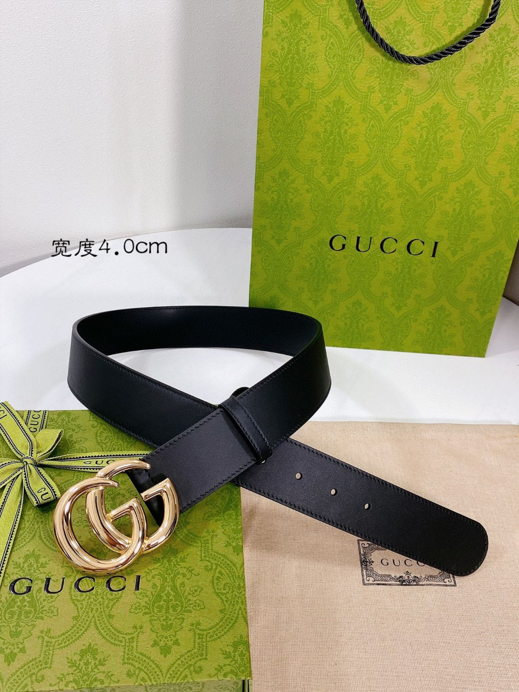 Gucci GG Marmont black leather belt with a shiny gold-toned double G buckle