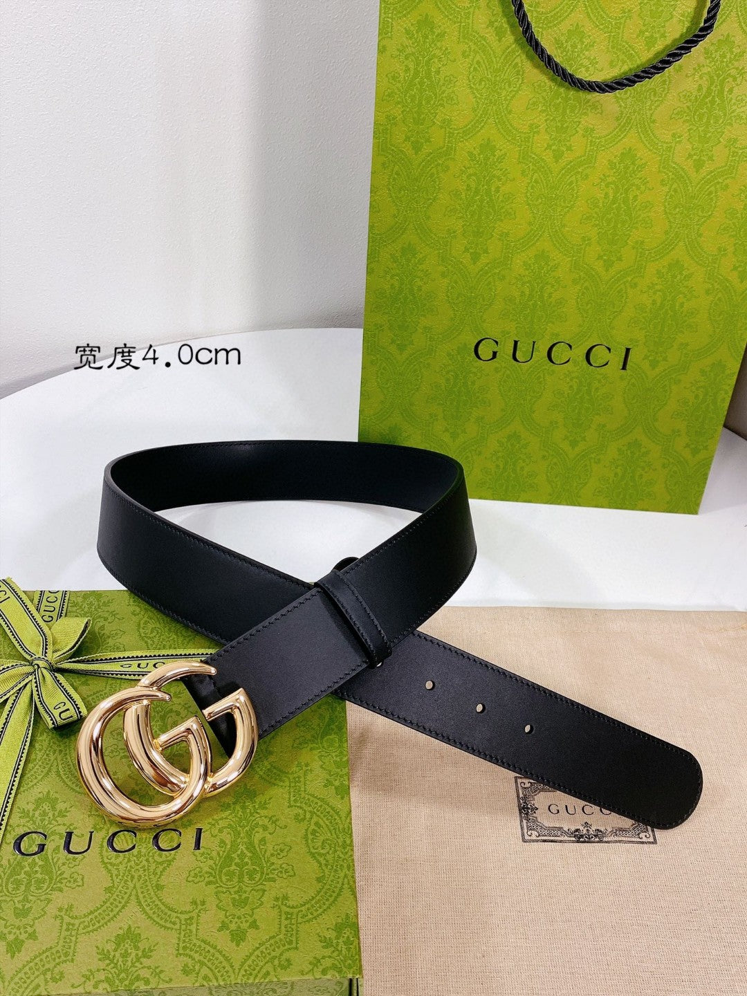 Gucci GG Marmont black leather belt with a shiny gold-toned double G buckle