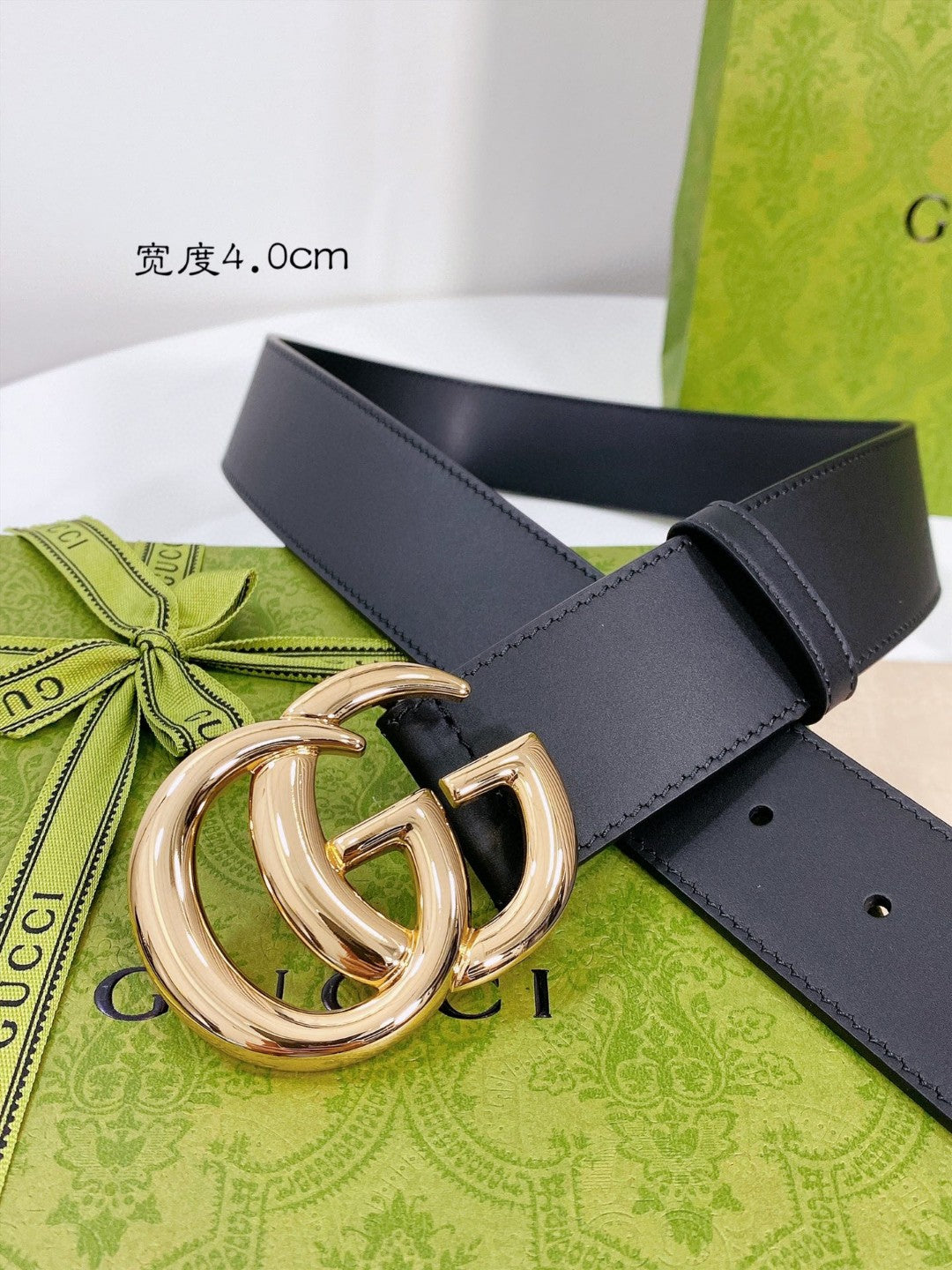 Gucci GG Marmont black leather belt with a shiny gold-toned double G buckle