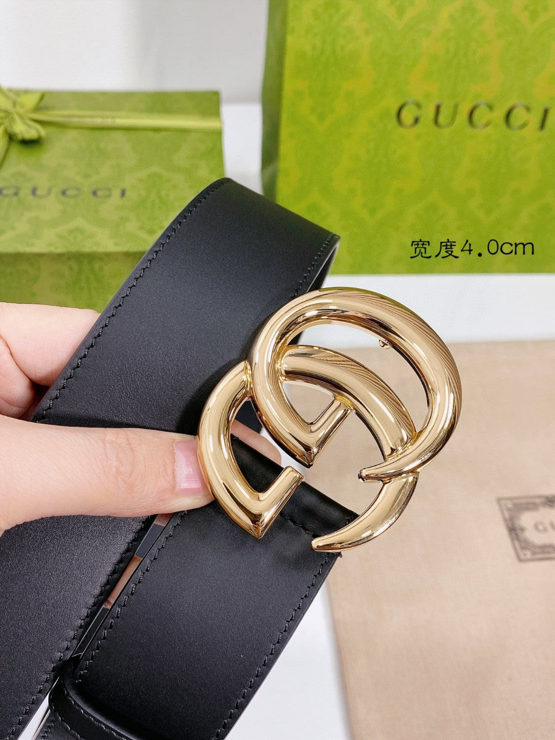 Gucci GG Marmont black leather belt with a shiny gold-toned double G buckle