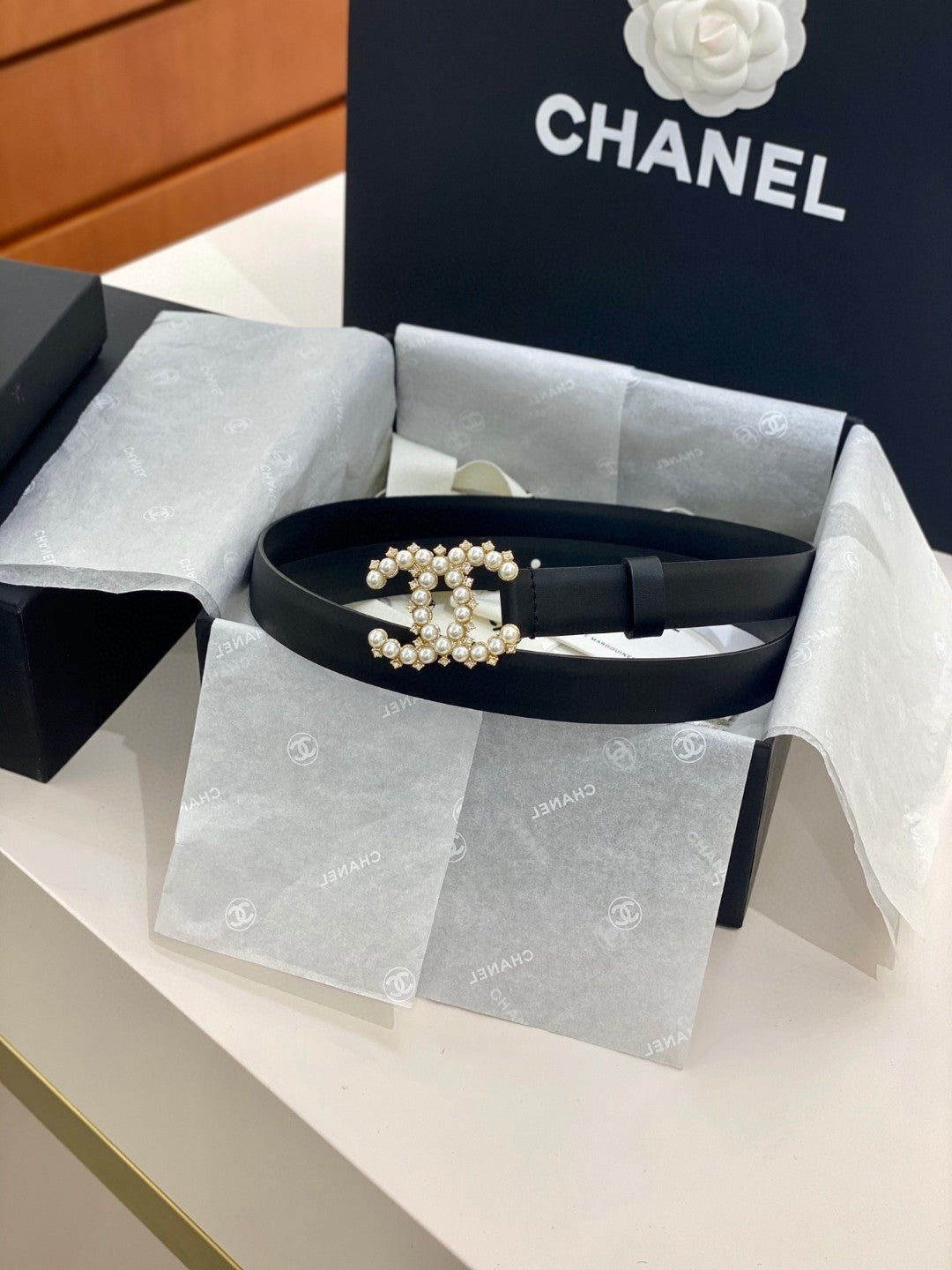 Chanel black leather belt with a pearl and diamante CC buckle