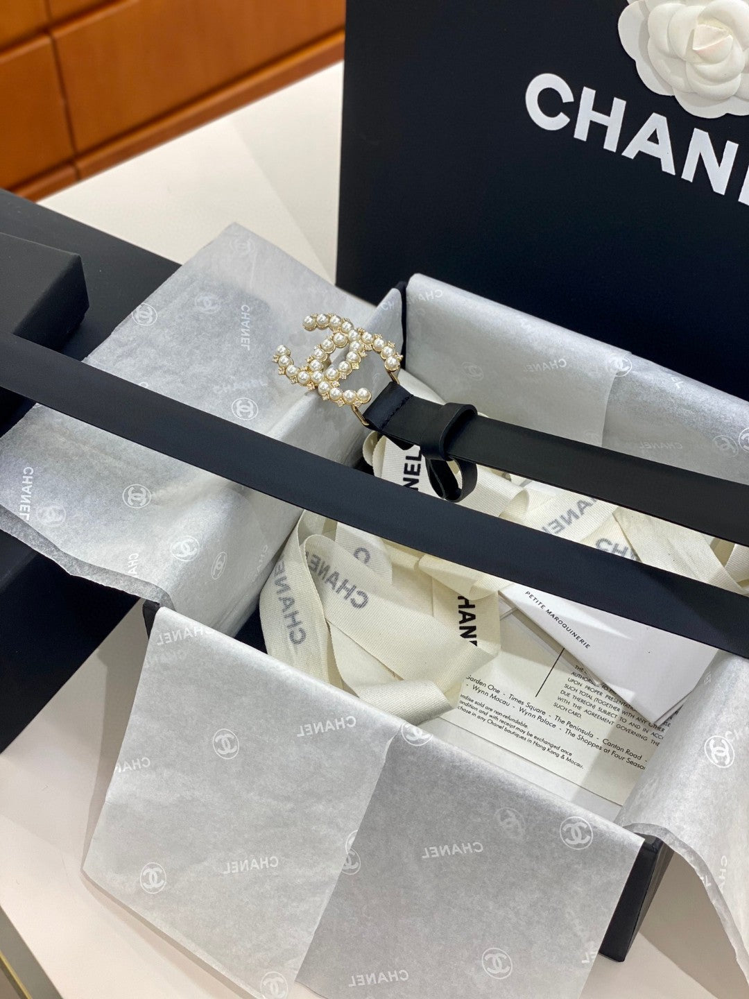 Chanel black leather belt with a pearl and diamante CC buckle