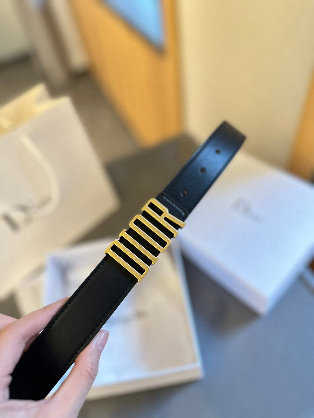 Dior D-Fence belt in black smooth calfskin leather with an antique gold-finish metal 'DIOR' buckle