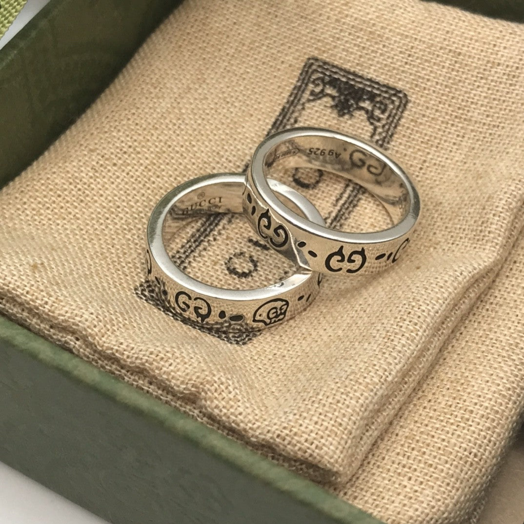 Gucci Ghost sterling silver rings featuring a skull motif