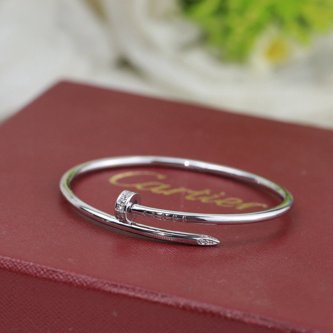 Cartier Juste un Clou bracelets in yellow gold, rose gold, and white gold with diamonds