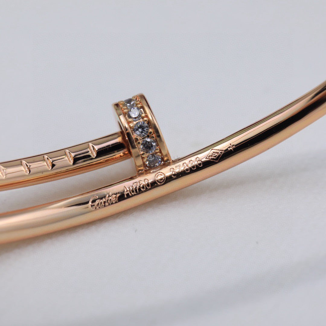 Cartier Juste un Clou bracelets in yellow gold, rose gold, and white gold with diamonds