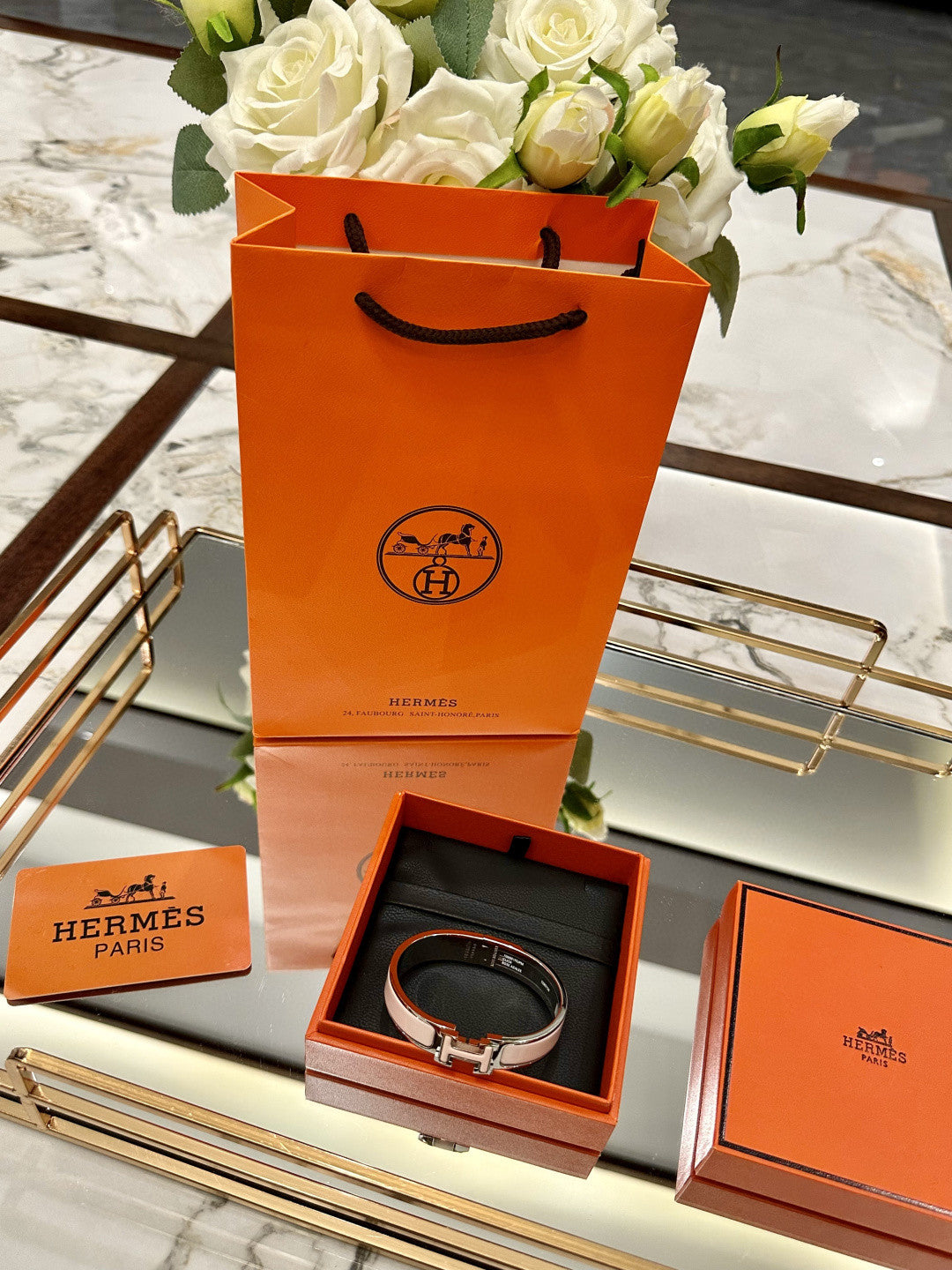 Hermès Clic H bracelet in pink enamel with a rose gold-plated finish