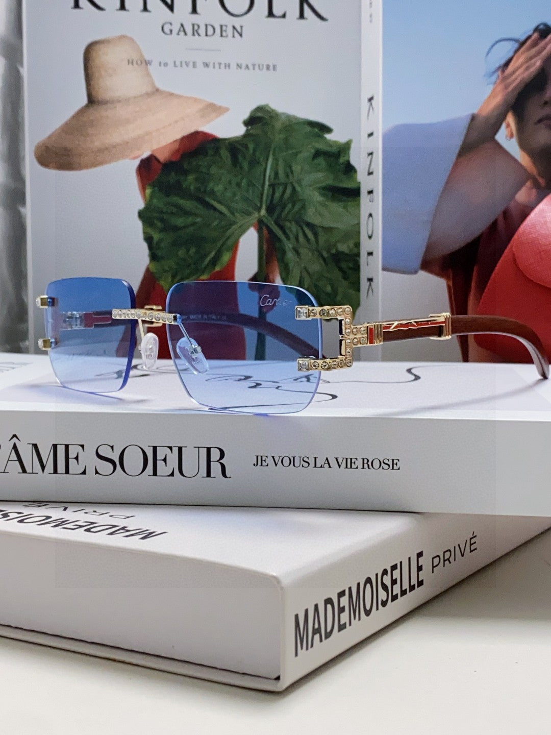 Cartier rimless sunglasses with blue gradient lenses and gold-finish metal