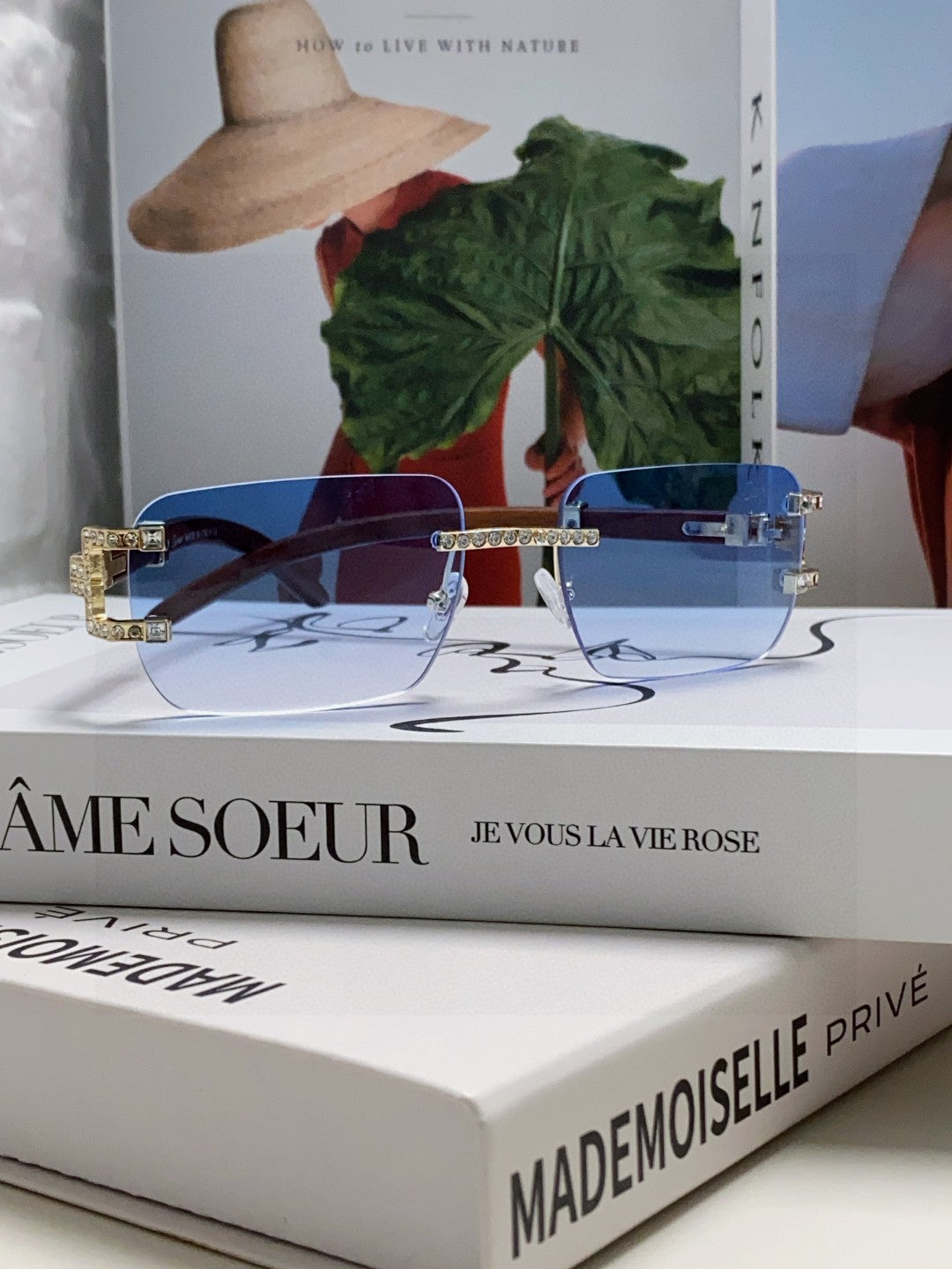 Cartier rimless sunglasses with blue gradient lenses and gold-finish metal