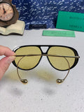 Bottega Veneta BV1273S Drop Aviator sunglasses with a black frame and yellow lenses