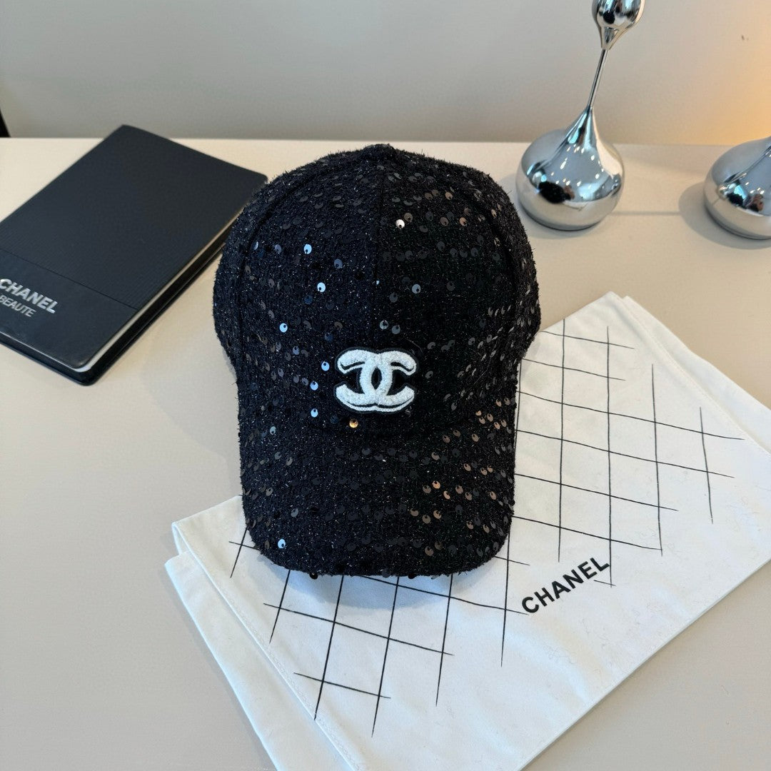 Chanel black sequin embellished baseball cap with a white CC logo