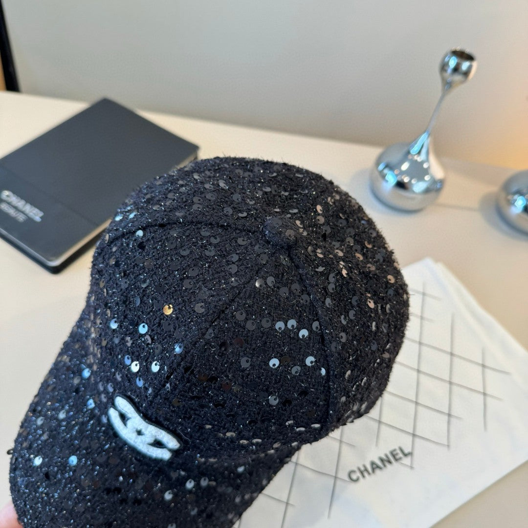 Chanel black sequin embellished baseball cap with a white CC logo