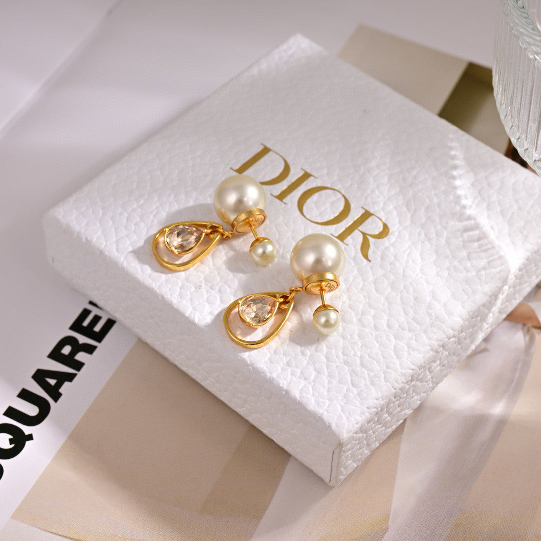 Dior Tribales earrings in gold-finish metal and white resin pearls