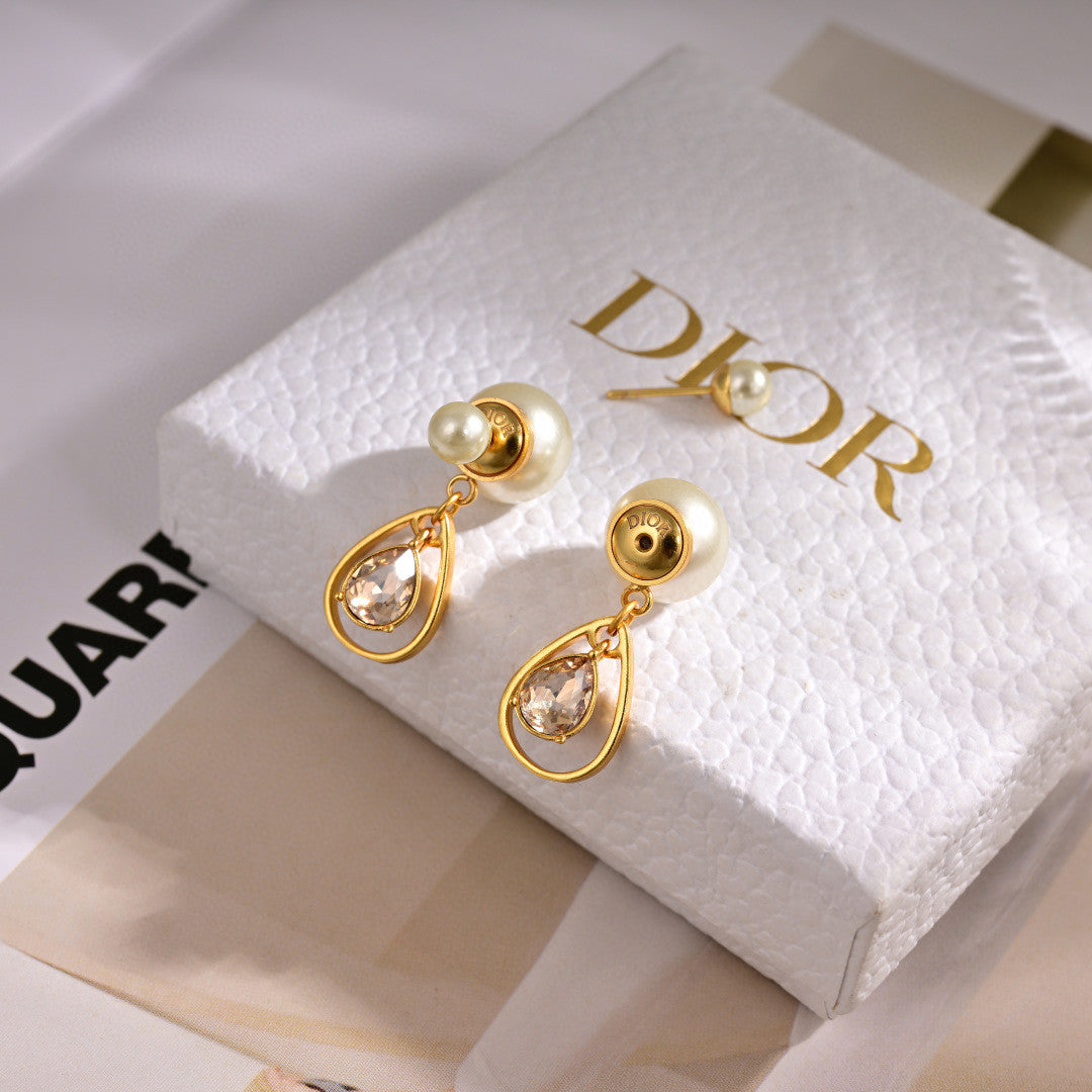 Dior Tribales earrings in gold-finish metal and white resin pearls