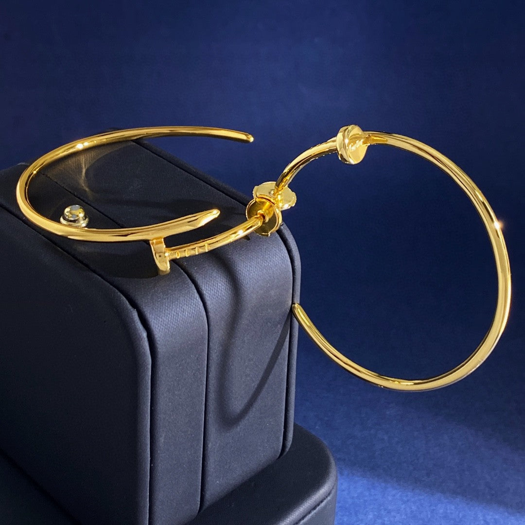 Cartier Juste un Clou hoop earrings in yellow gold