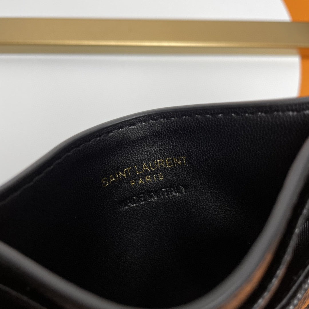 Saint Laurent Cassandre Matelassé card case in black grain de poudre leather with a gold-tone logo