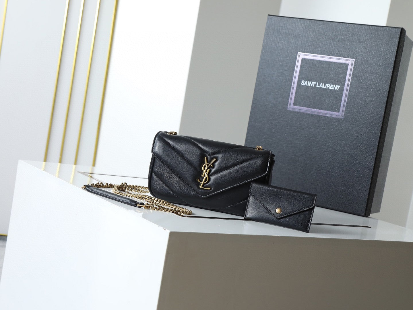 Saint Laurent Loulou mini chain bag in black chevron-quilted lambskin