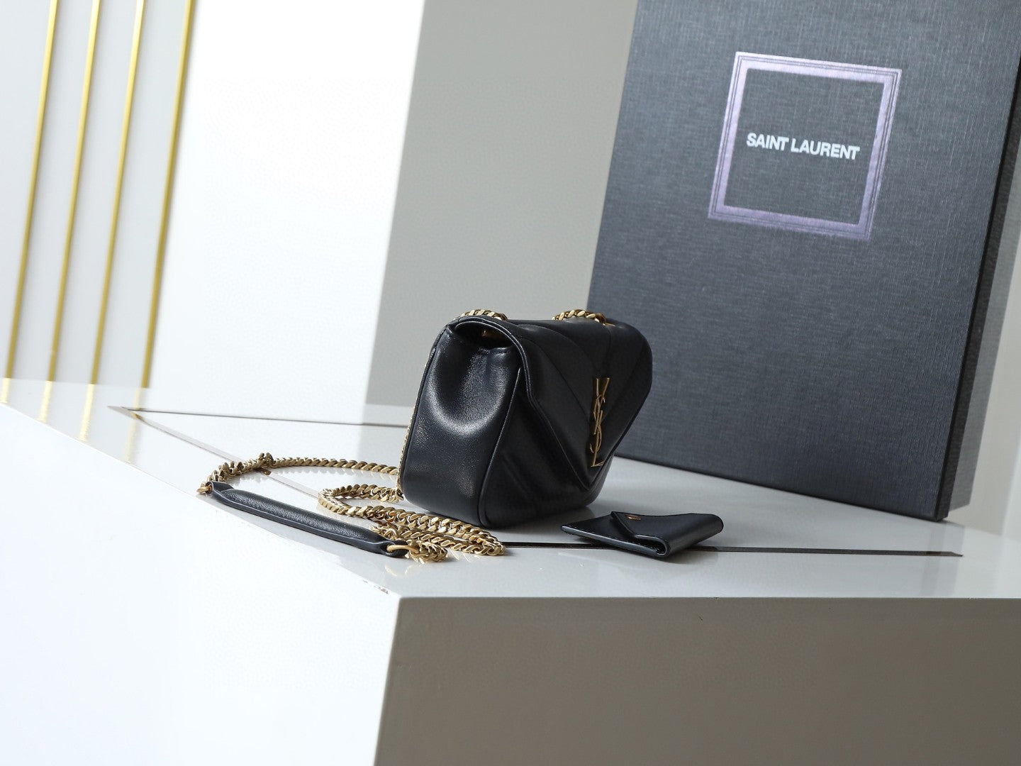 Saint Laurent Loulou mini chain bag in black chevron-quilted lambskin