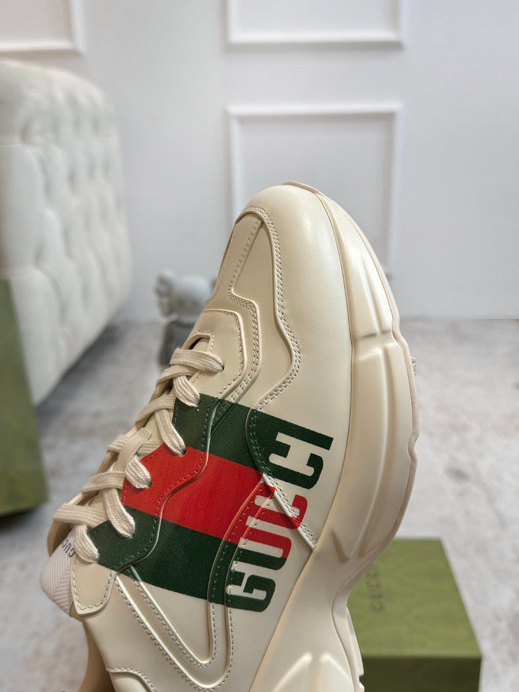 Gucci Men's Rhyton Retro Logo Sneakers in ivory leather with the signature green and red web print