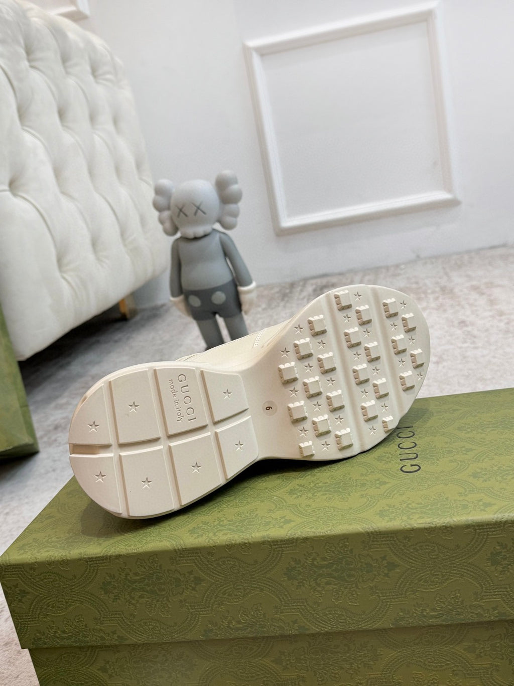 Gucci Men's Rhyton Retro Logo Sneakers in ivory leather with the signature green and red web print