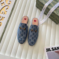 Gucci Princetown mules in light blue and ivory GG denim with gold-tone horsebit hardware