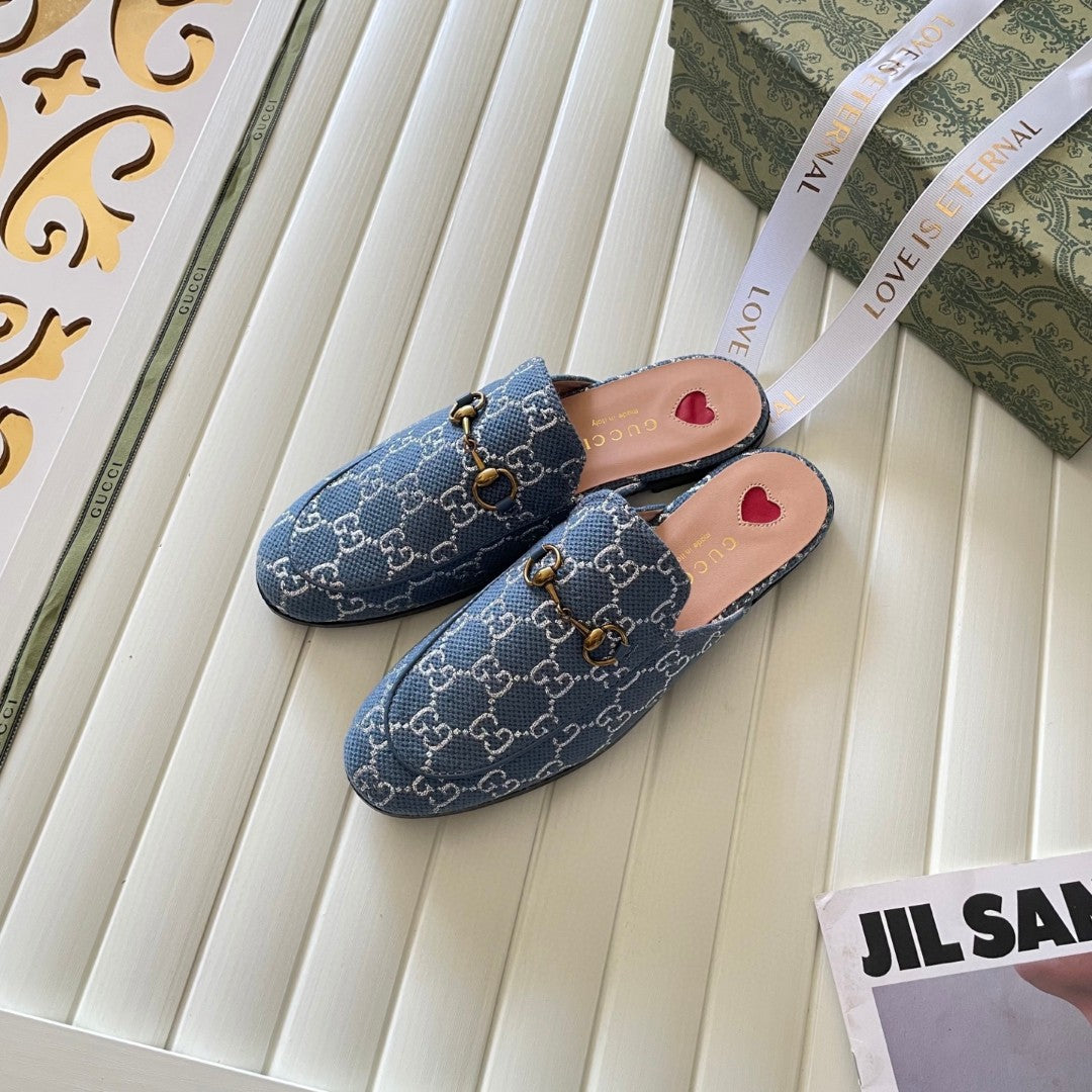 Gucci Princetown mules in light blue and ivory GG denim with gold-tone horsebit hardware