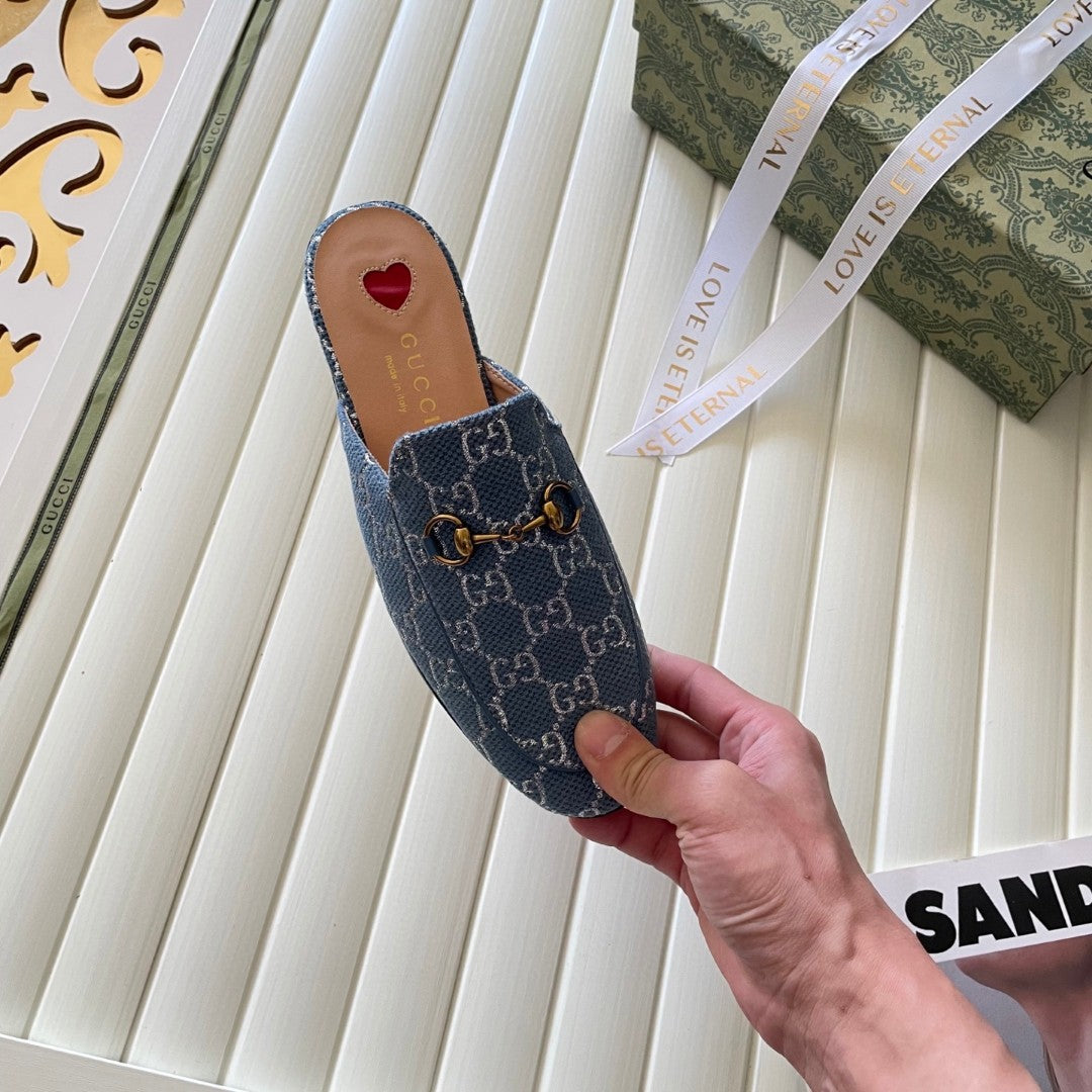 Gucci Princetown mules in light blue and ivory GG denim with gold-tone horsebit hardware