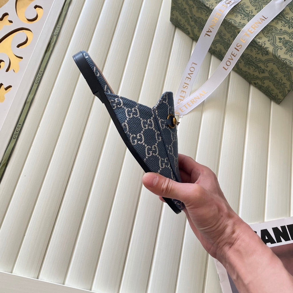 Gucci Princetown mules in light blue and ivory GG denim with gold-tone horsebit hardware