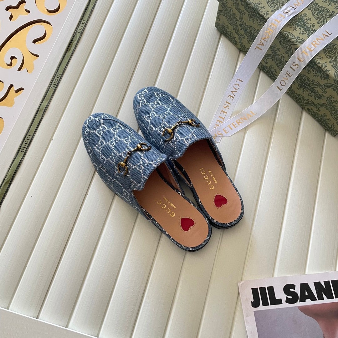 Gucci Princetown mules in light blue and ivory GG denim with gold-tone horsebit hardware