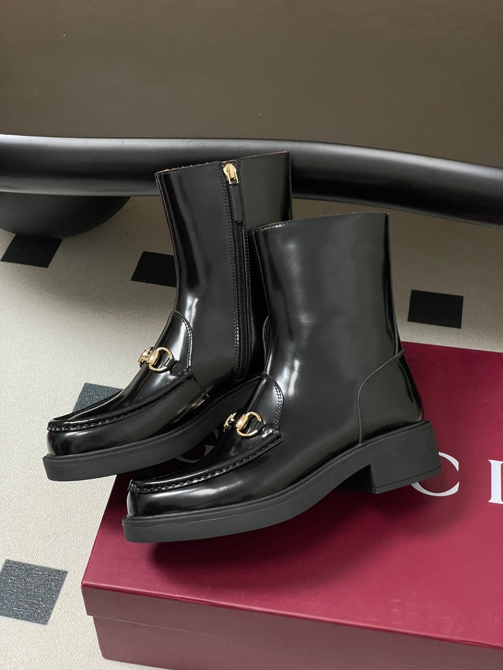 Gucci Horsebit boots in black patent leather