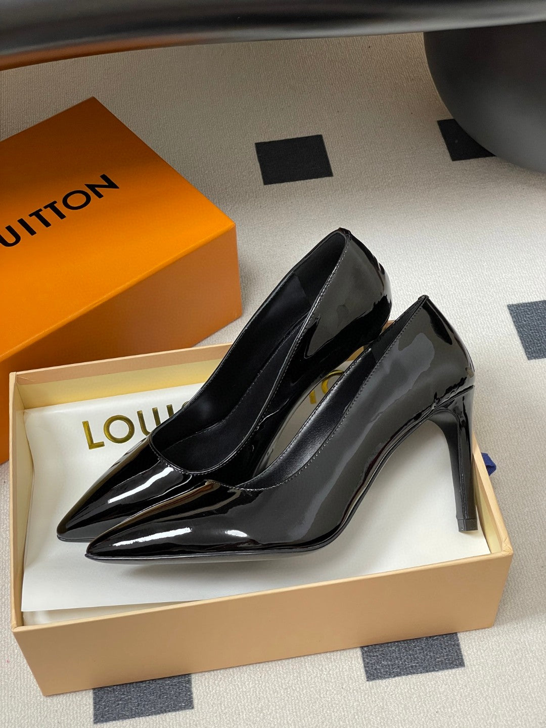 LV women's pointed-toe stiletto high-heel pumps in black and nude patent leather