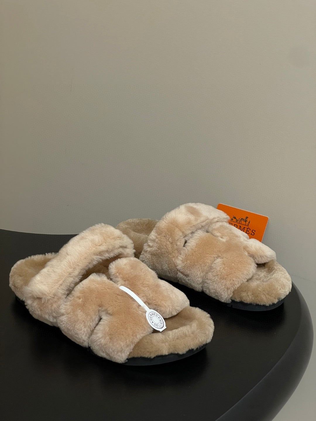 Hermès Oran sandals in shearling material