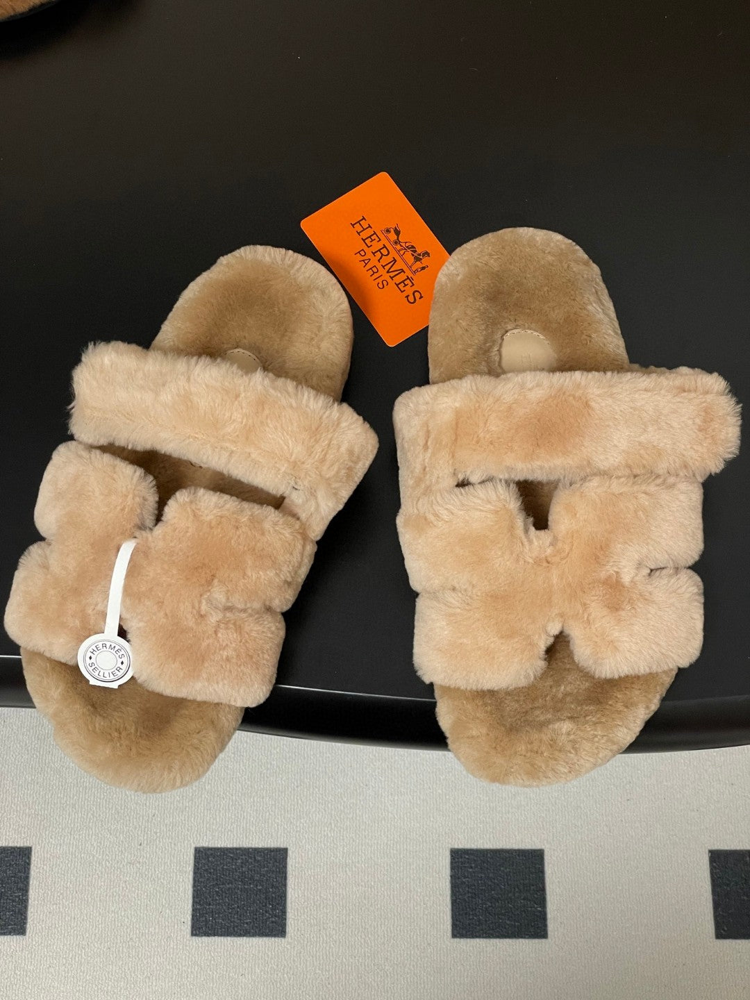 Hermès Oran sandals in shearling material