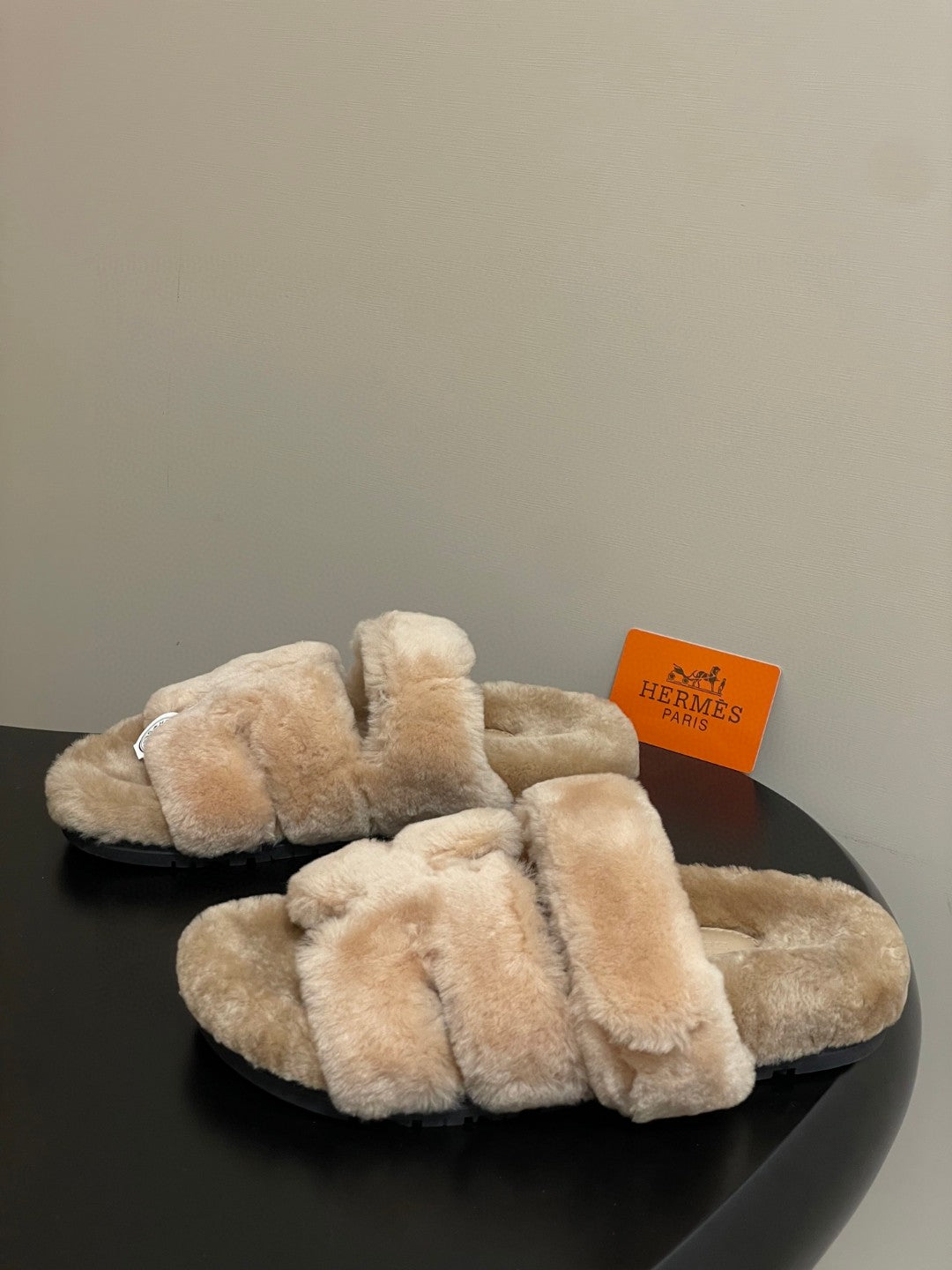Hermès Oran sandals in shearling material