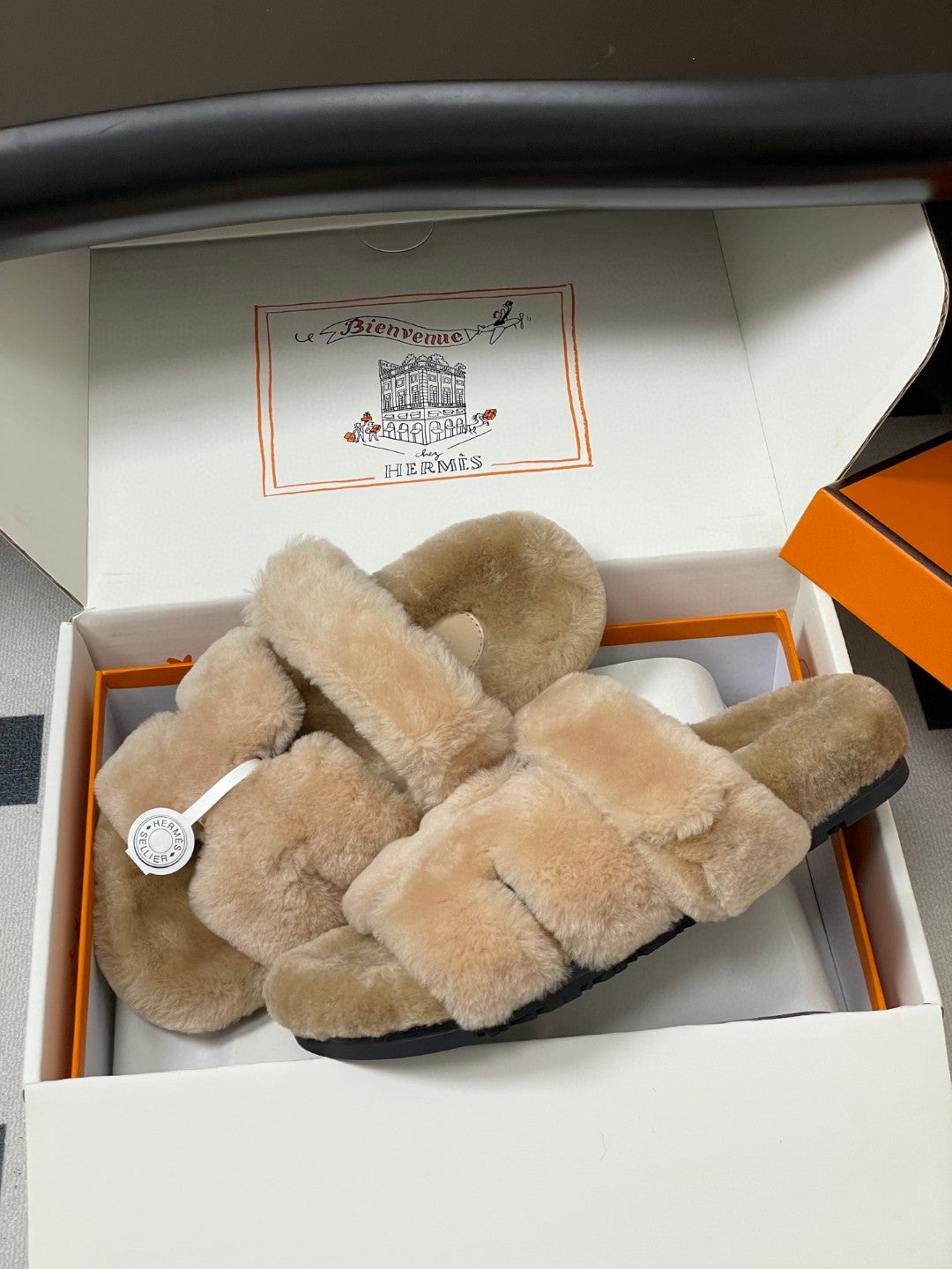 Hermès Oran sandals in shearling material