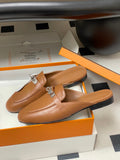Hermès Oz mules in brown calfskin leather with a palladium-plated Kelly buckle