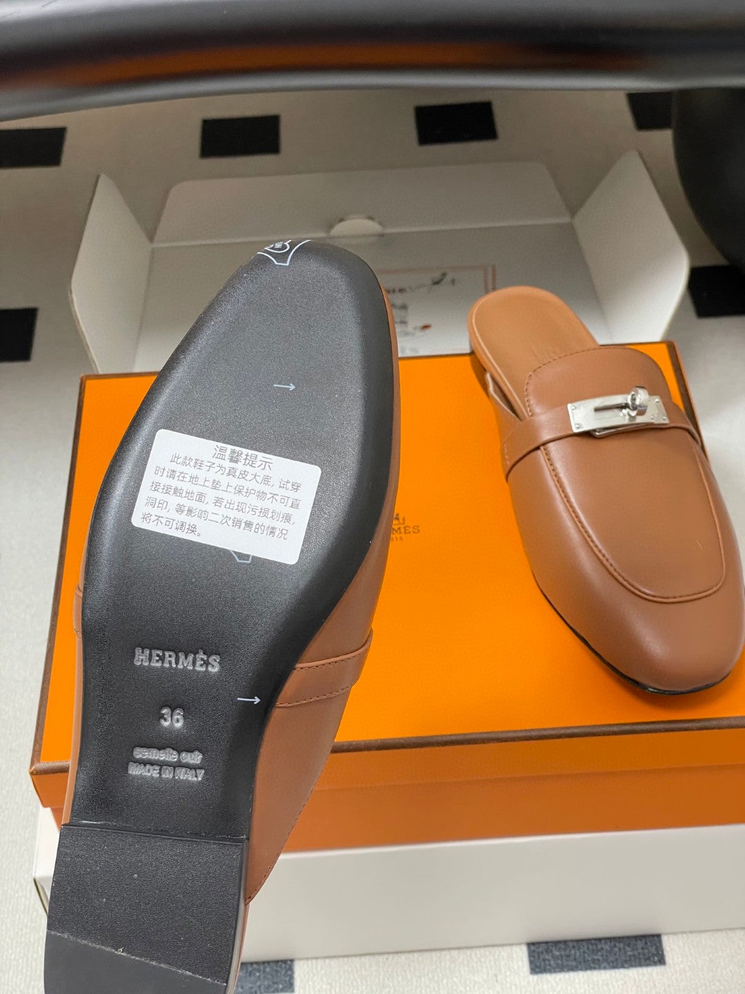 Hermès Oz mules in brown calfskin leather with a palladium-plated Kelly buckle