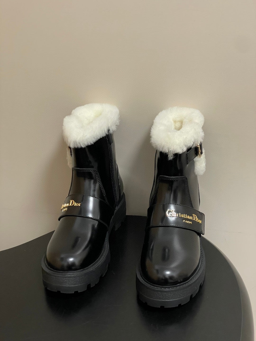 DiorAlps D-Quest Ankle Boots in black grained calfskin with white lambskin shearling
